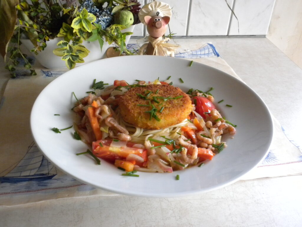Visburger op een bedje van spaghetti
