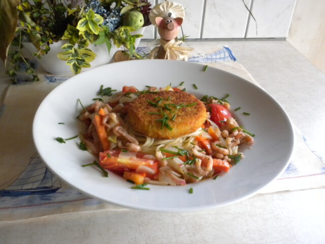Visburger op een bedje van spaghetti
