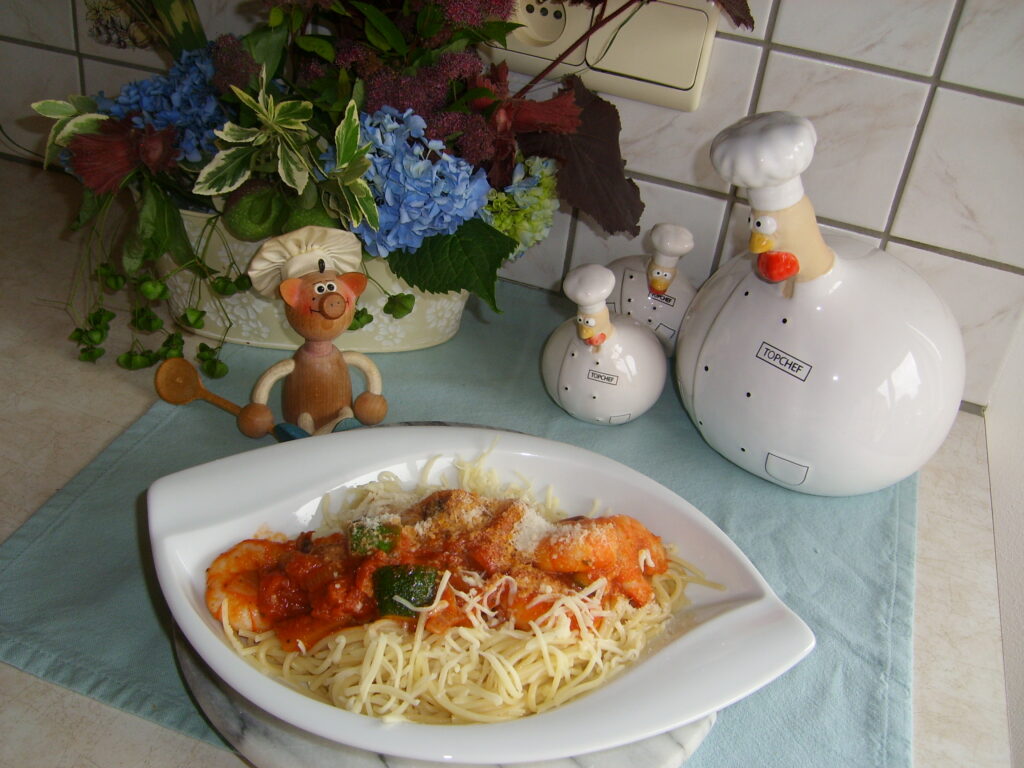 Spaghetti met scampi’s in een pecorino tomatensausje