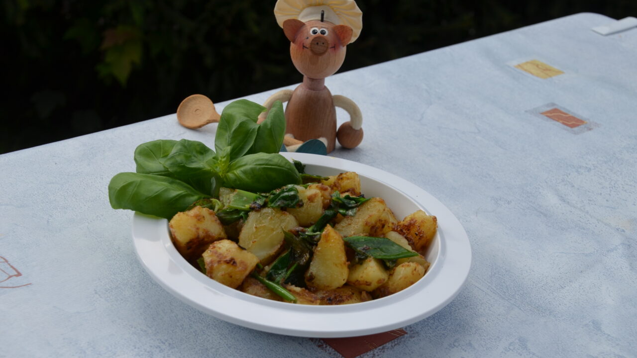 Vakantie: opgebakken aardappelen met een groen tintje