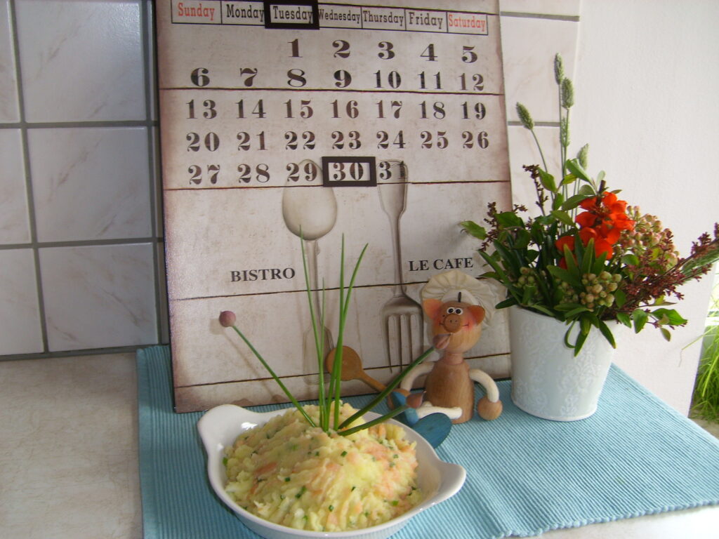 Aardappelpuree met een fantasie van gerookte zalm en bieslook