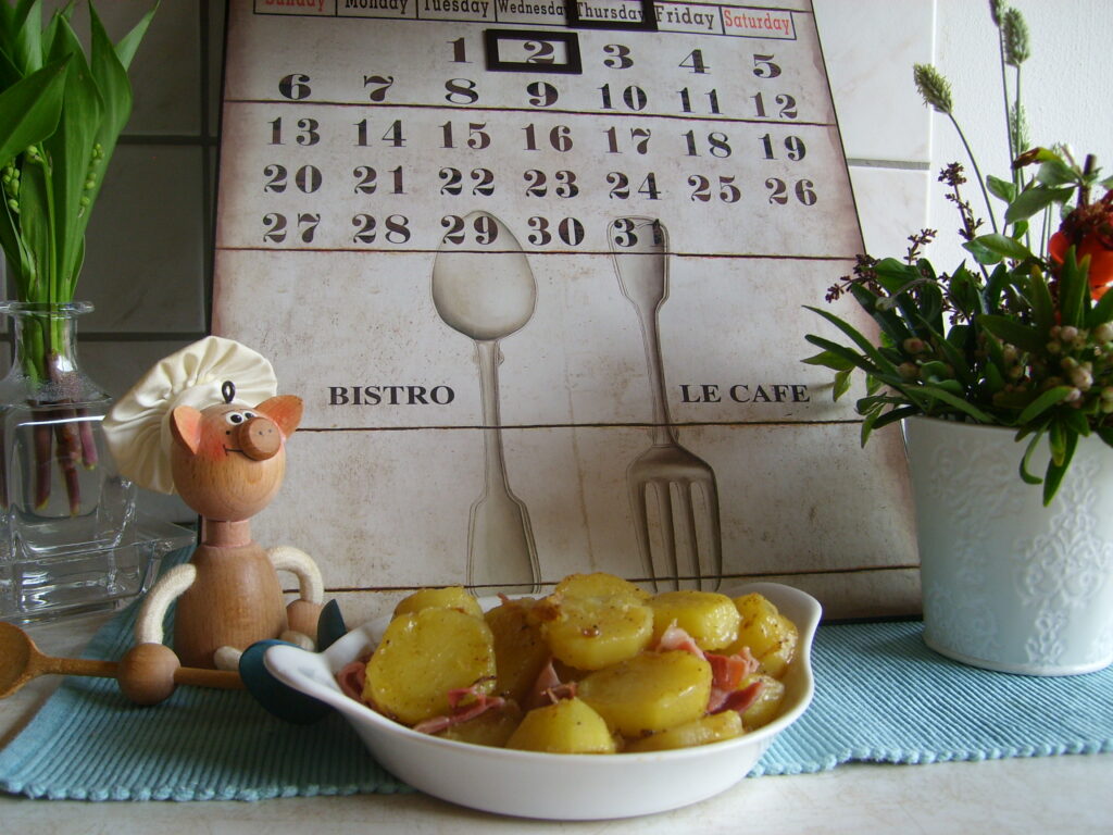Aardappelen opgebakken met een Duits fijn gesneden hammetje