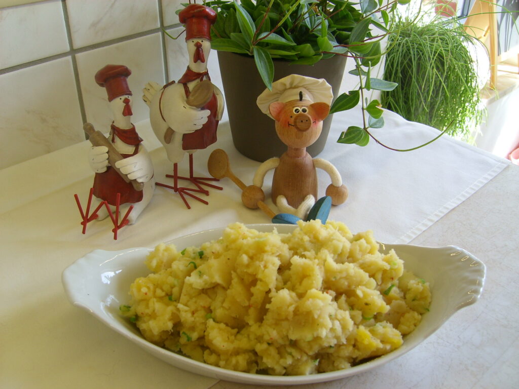 Aardappelpuree: mango, lenteui en viskruiden