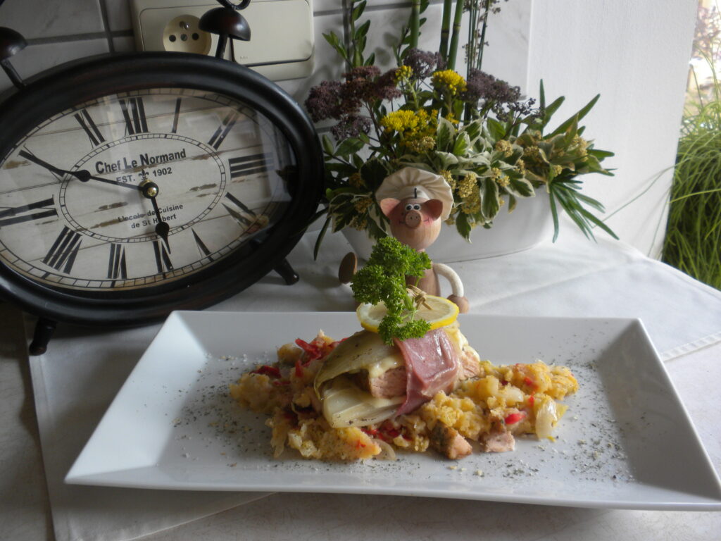 Dagschotel: gevuld witloof met zalm op een bedje van puree