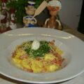 Vader en dochter verwennen Popeye met spinazie gevulde tortellini