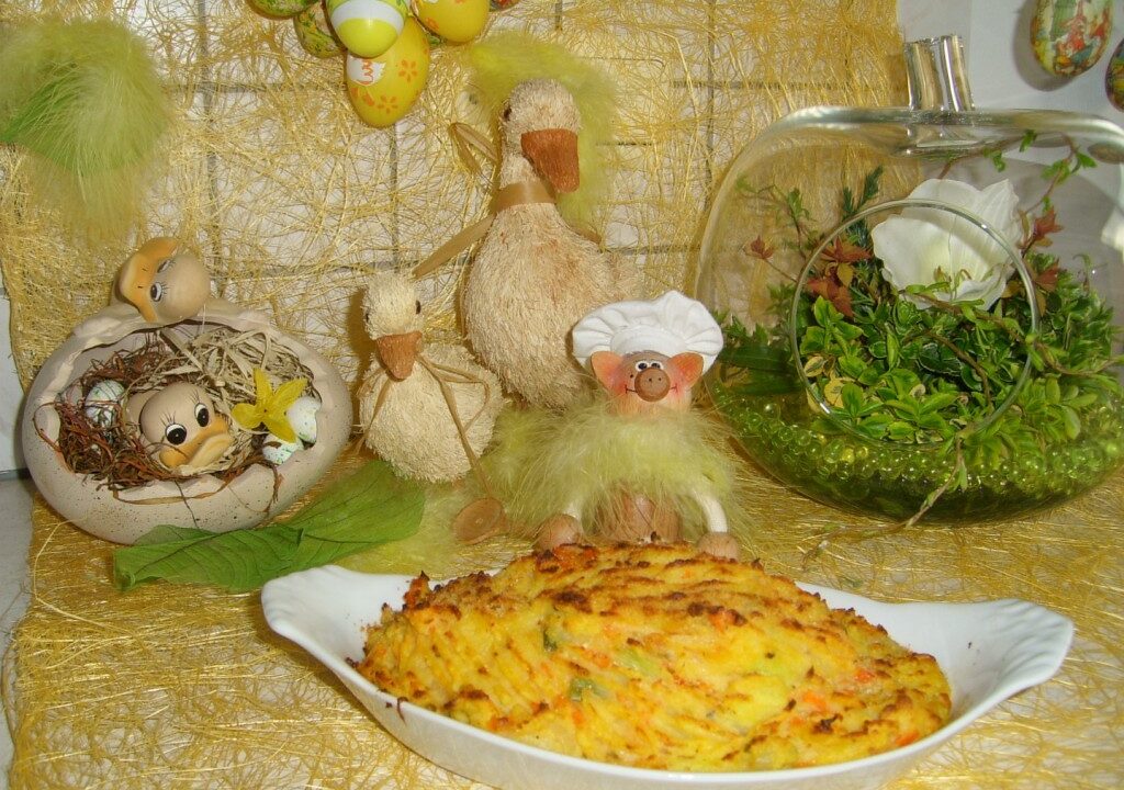 Aardappelpuree met lente groenten onder de grill