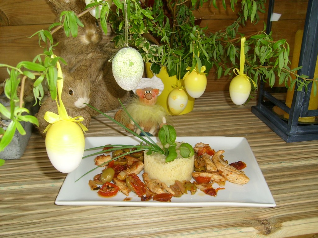 Couscous met kalkoenreepjes tomaatjes en olijven