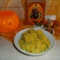 Aardappelpuree met blokjes pompoen en peterselie