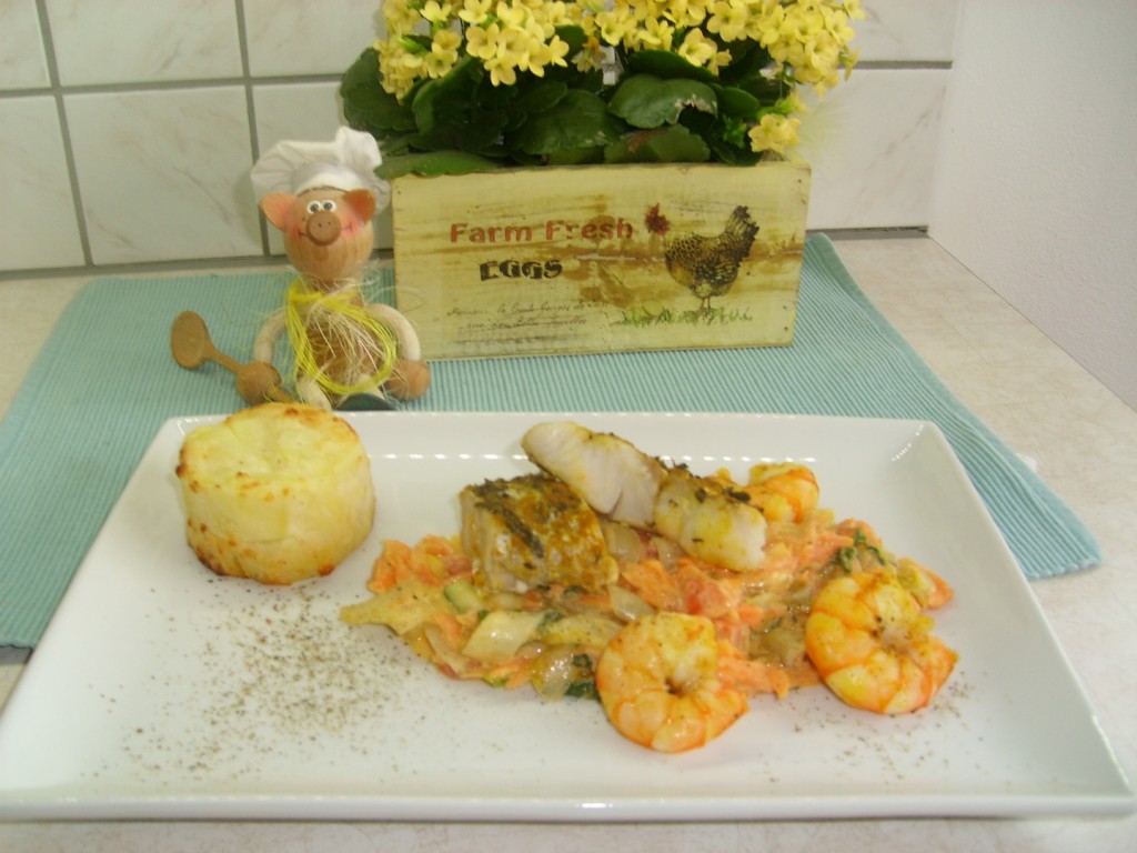 Dagschotel: gratin-torentje met kabeljauw, scampi’s in een sausje van groenten