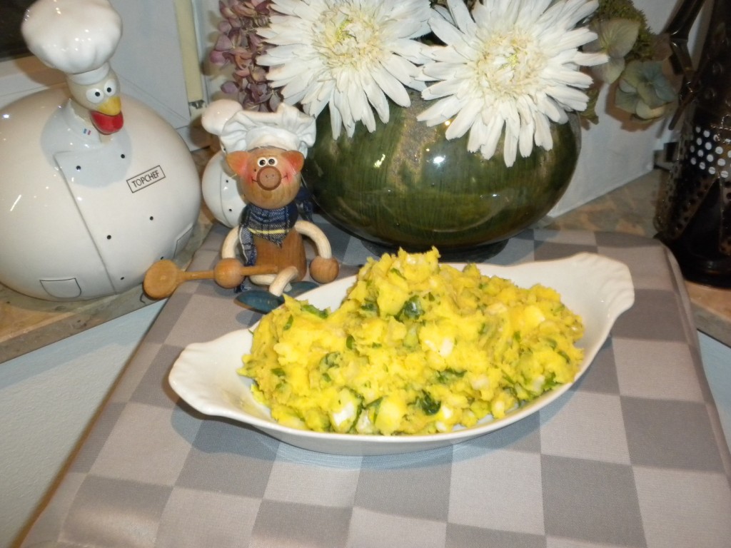 Aardappelpuree met witloof en rucola