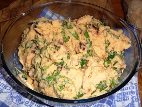 Stamppotje van rucola en zongedroogde tomaatjes