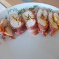 Kipfilet in Parmaham, gevuld met pesto, geitenkaas en tomaten