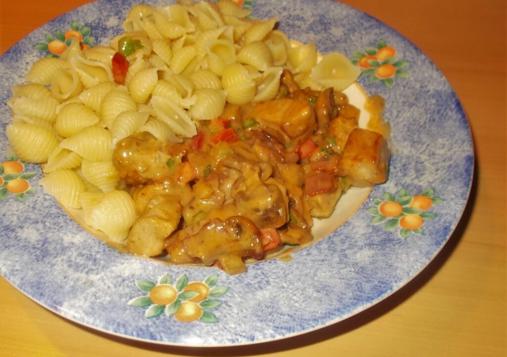 Varkenshaas in chili-roomsaus