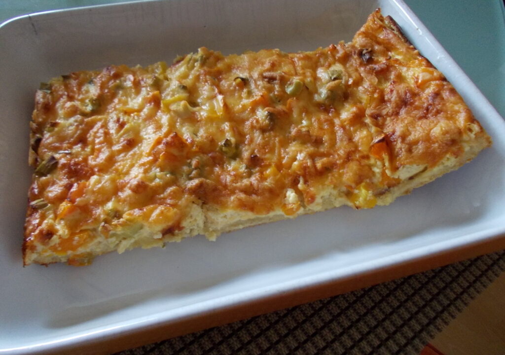 Quiche van casinobrood met ham, kaas, champignons, paprika en eieren