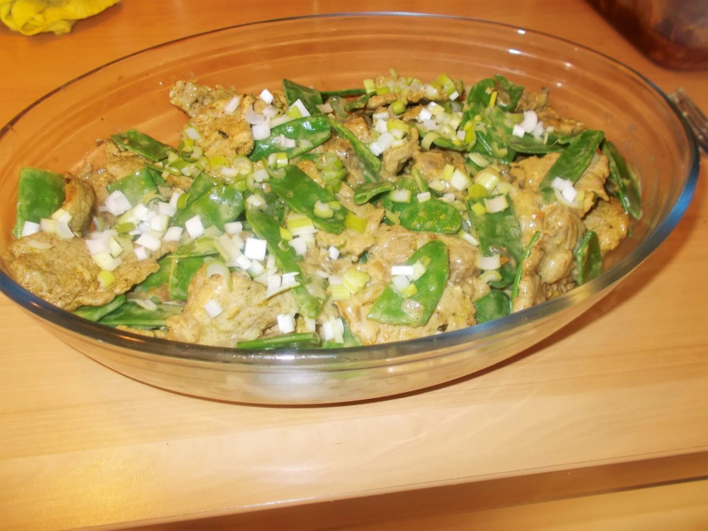 Thaise curry van varkenshaas met peultjes.
