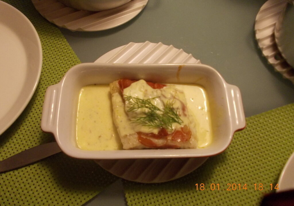 Zeewolffilet met serranoham en wittewijnmosterdsaus uit de oven