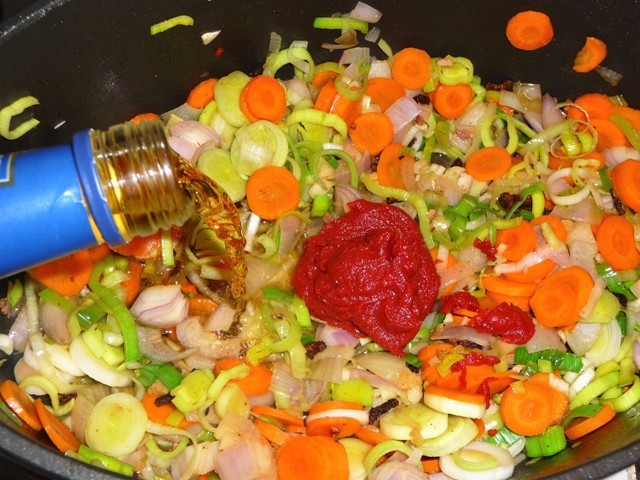 Coq au vin met cognac en paddenstoelen