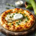 Flammkuchen met courgette en tuinerwten