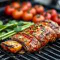 Iberico varkensmedaillon en gemarineerde kerstomaten met Piment d’Espelette en laurier