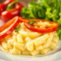 Nijlbaars met aardappelpuree van savooi en groenten