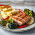 Suprême varkensgebraad met gegrilde broccoli en knoflookpuree