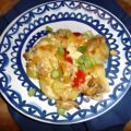 Aardappelgratin met paprika en champignons