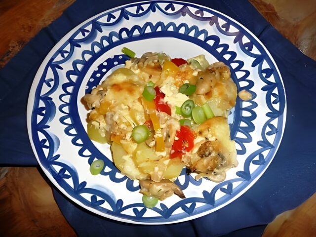 Aardappelgratin met paprika en champignons