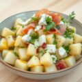 Aardappelsalade met rauwe ham en geitenkaas