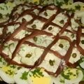 Aardappelsalade met zure room en ansjovis.
