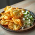 Aardappeltempura met zuurkool feta en munt