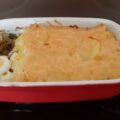 Pittig gekruide andijvie met bacon, ei en aardappelschijfjes