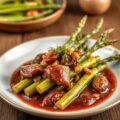Asperges met ossenhaas en rode wijn saus