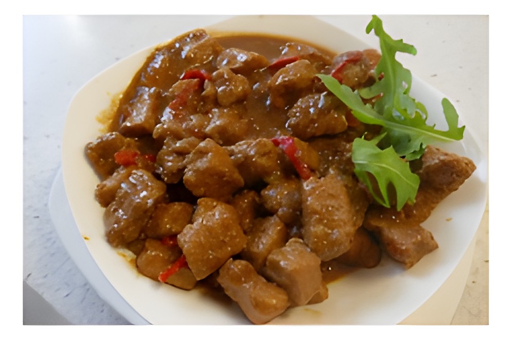 Be Celeng Base Manis ( gestoofde hamlappen in ketjapsaus…..)