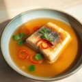 Bouillon met zalm en pepertjes