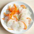 Carpaccio van schelvis met gekonfijte worteltjes