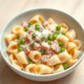 Conchiglie met ham en erwtjes
