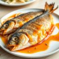 Filets van zeebarbeel met sinaasappelsaus