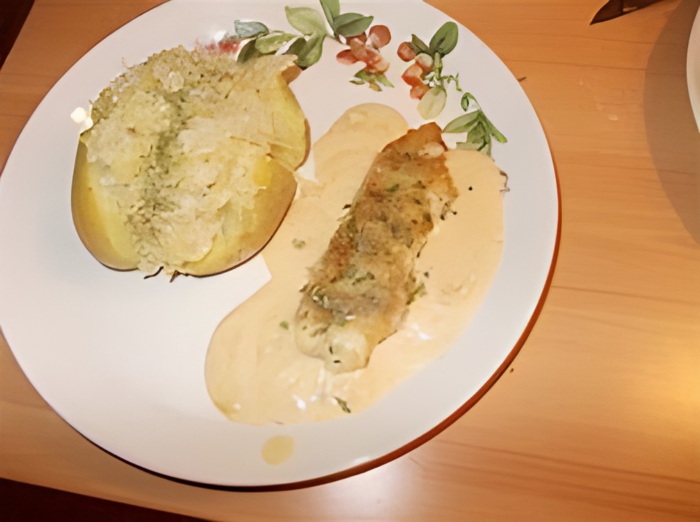 Gebakken zeewolffilet met witte wijnsaus