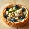 Gevuld rond brood met visragout