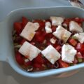 Grieks hapje met warme feta, tomaat en olijven