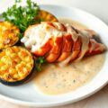 Kreeft met gegratineerde courgette en waterkers