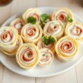 Omeletrolletjes met boursin en rauwe ham