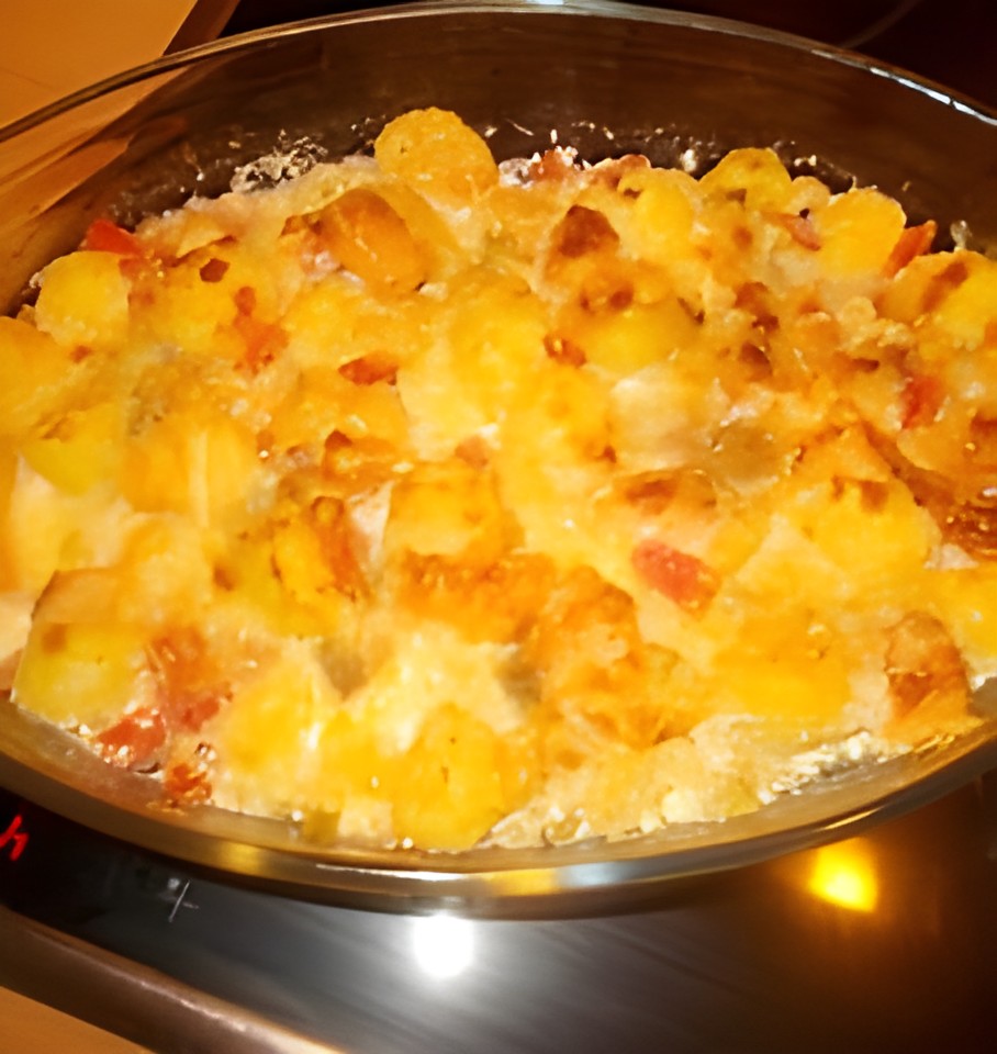 Ovenschotel aardappelen krieltjes met zalm, tomaten en lenteuitjes