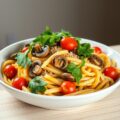 Penne met kastanjechampignons en rucola