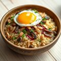 Quinoa met paddenstoelen en een gebakken eitje