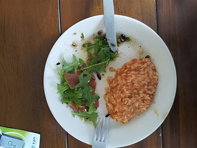 Risotto met bacon en gedroogde tomaten