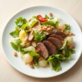 Salade van andijvie en gebakken druiven