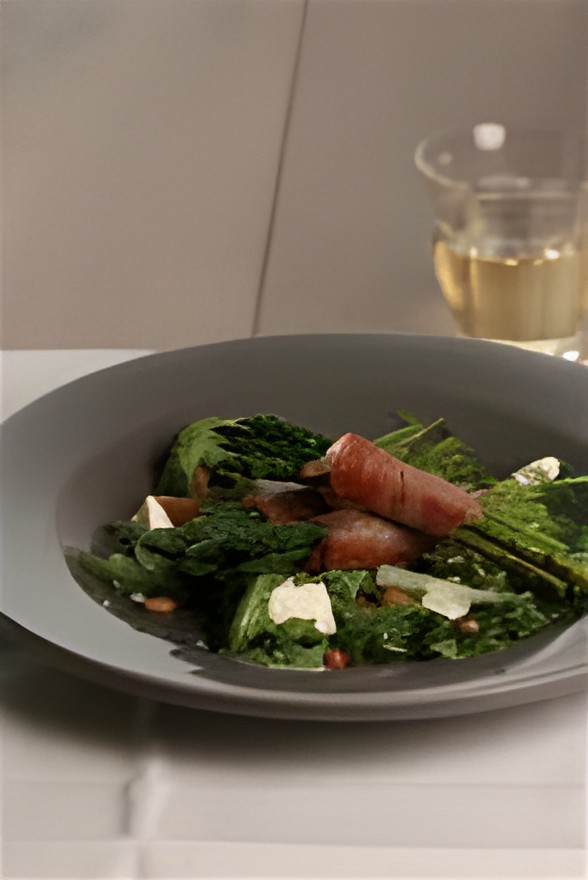 Salade van groene asperges met geitenkaas en sinaasappeldressing