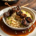 Saté van struisvogel met risotto