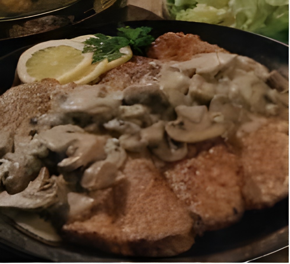 Schnitzels met champignon-citroensaus